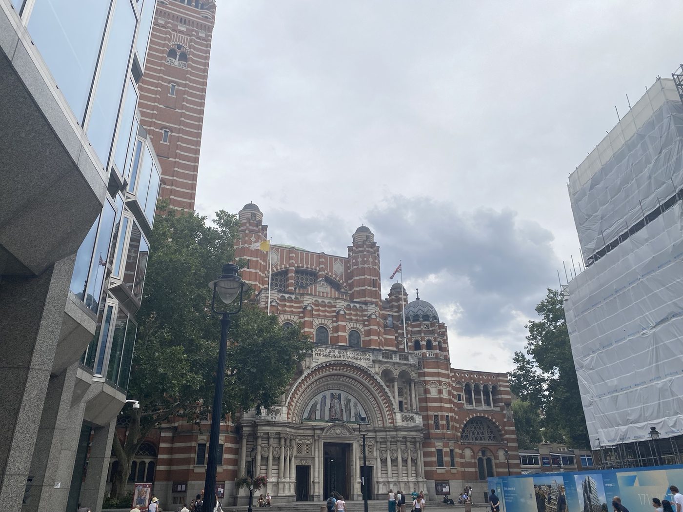 Westminster Cathedral’s striped brick front under a cloudy sky